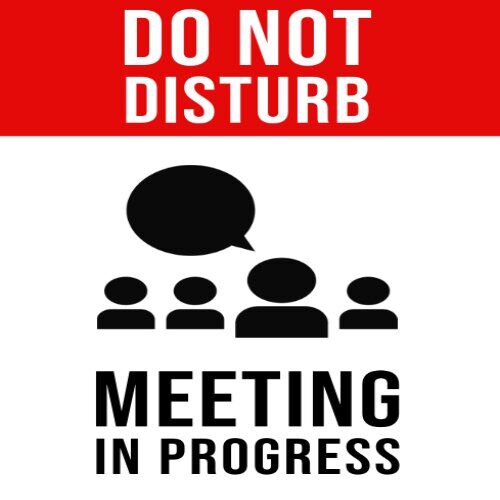Clear "Do Not Disturb-Meeting In Progress" sign for a confidential meeting in Lagos.