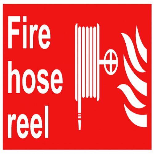 Safety "Fire Hose Reel" location sign in a bustling Lagos mall.