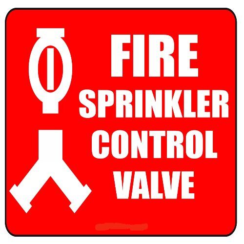 Safety-compliant "Fire Sprinkler Control Valve" location sign in Nigeria.
