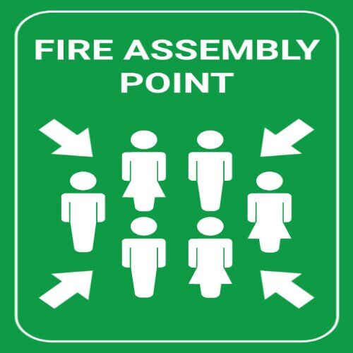 Clear Assembly Point sign with people pictogram for evacuation in Nigeria.